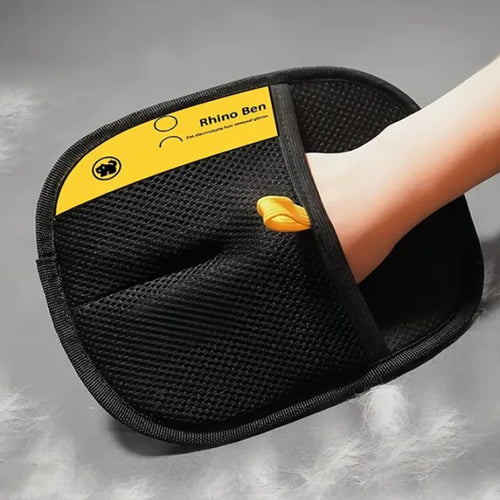Black massage pad with yellow label on a gray background