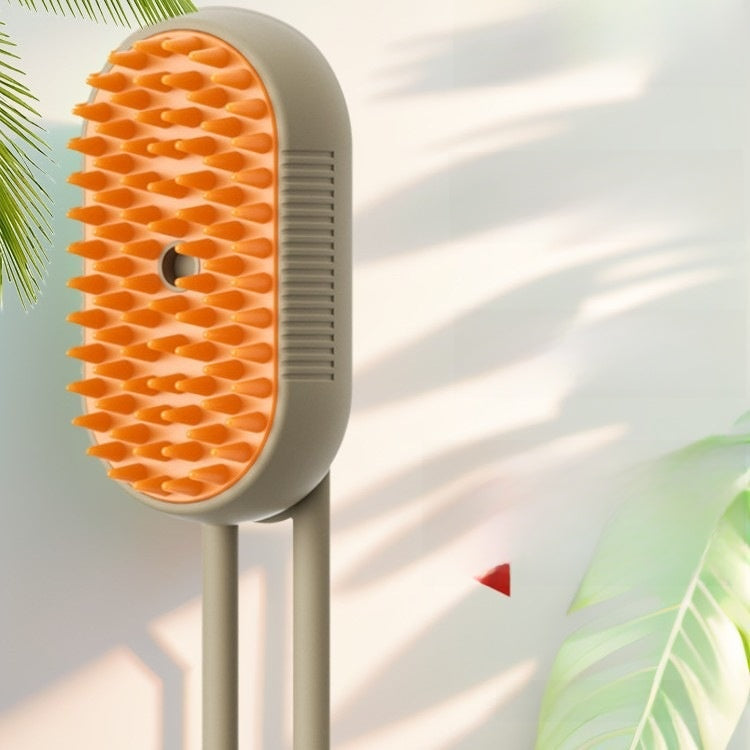 Grooming brush with orange bristles on a white background