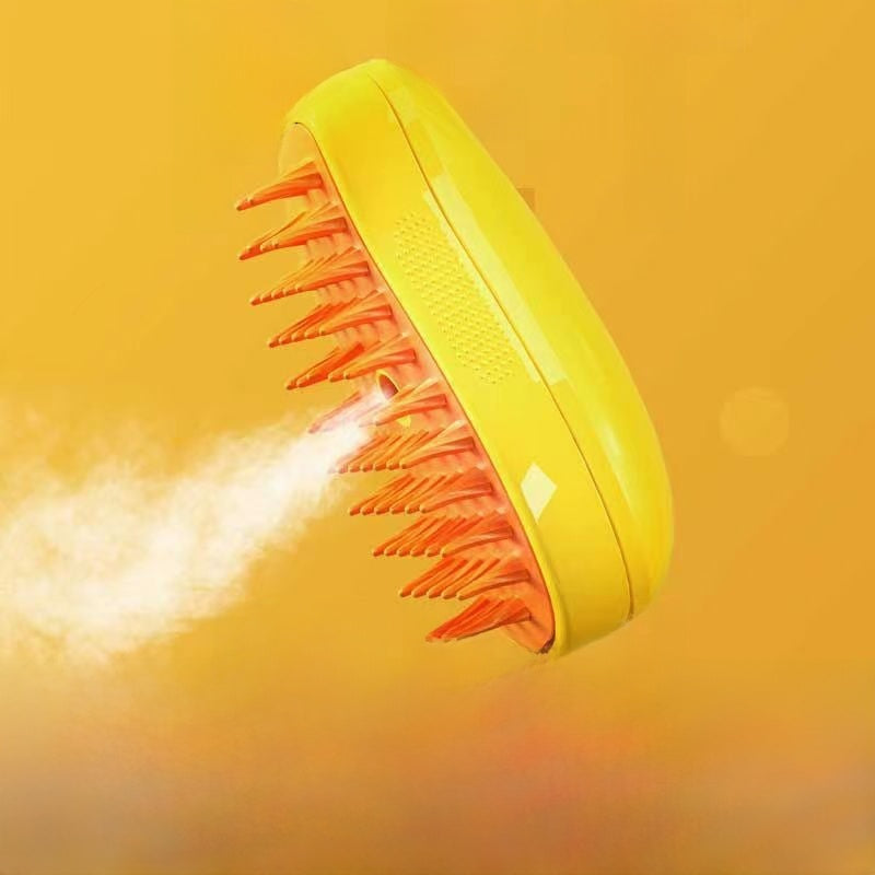 Yellow hairbrush with orange bristles on a yellow background